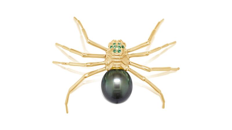 A 14-karat yellow gold Tahitian pearl spider brooch accented with tsavorite garnets ($3,395) by Parlé Gems Parlé Gems pearl spider brooch