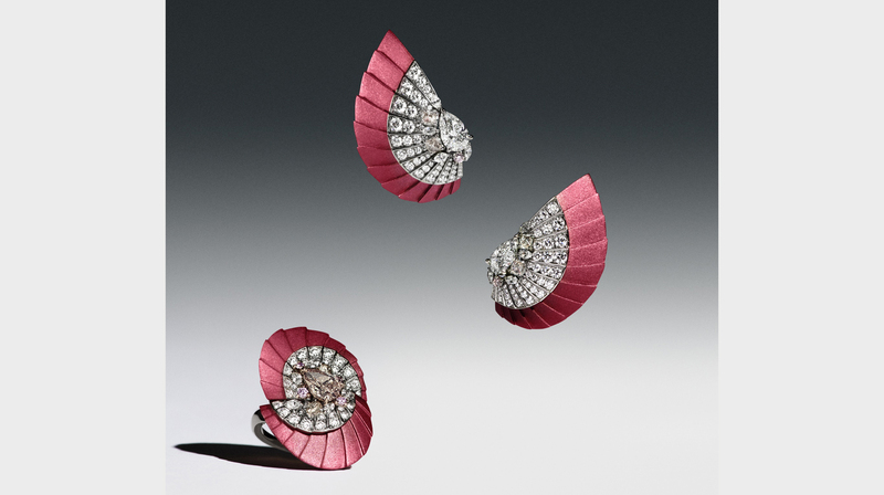 The pink aluminum and titanium earrings total 6.3 carats of diamonds, while the pink aluminum and titanium cocktail ring totals 4.89 carats of diamonds.
