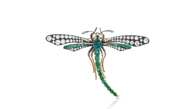 A dragonfly brooch in 18-karat gold with emeralds and diamonds by jewelry brand Cicada ($50,900) Cicada emerald and diamond dragonfly brooch