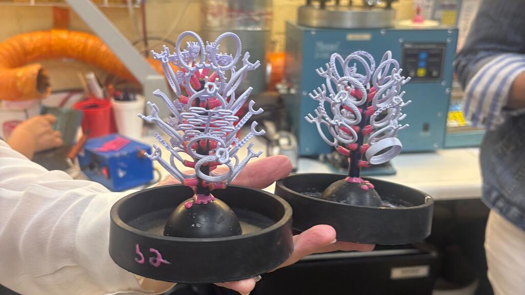 This is a “tree” of wax molds. Using the lost-wax casting process, the molds are filled with liquid metal. The wax then melts away to reveal the design. Wax tree Tacori molds
