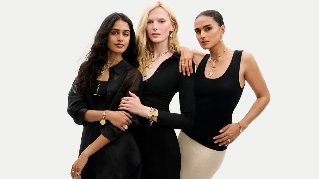 Models Mahi Kabra, Alex Consani, and Jill Kortleve in Pandora Talisman campaign