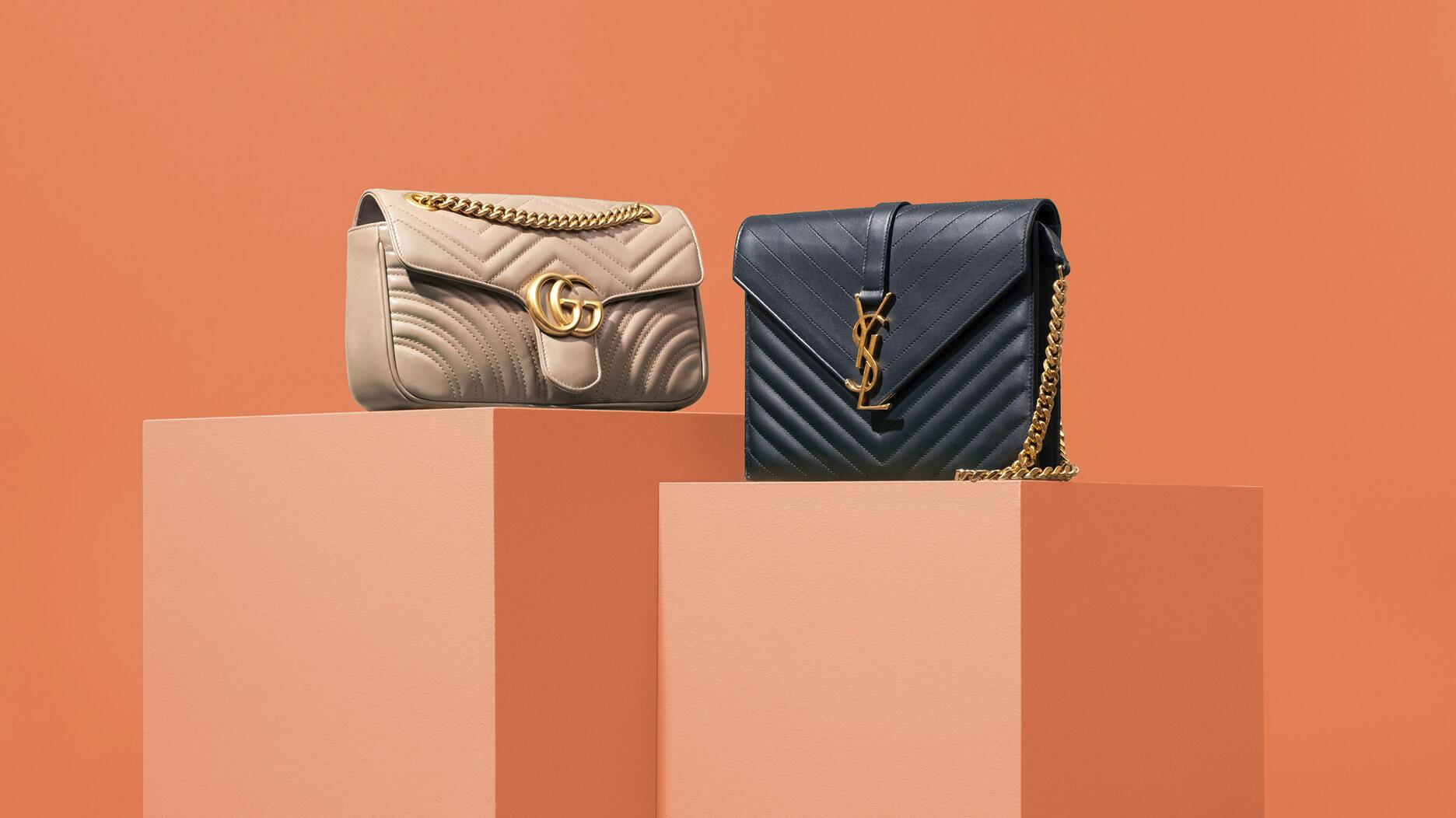 A Gucci purse and a YSL purse 