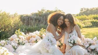 Two women in David's Bridal wedding dresses 